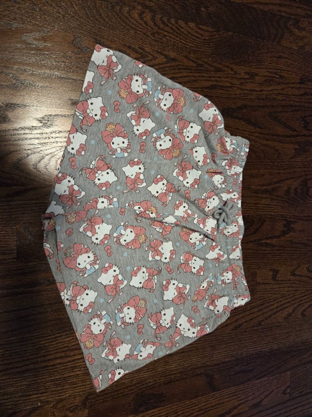 New Hello Kitty, print all over Jersey shorts. size small.